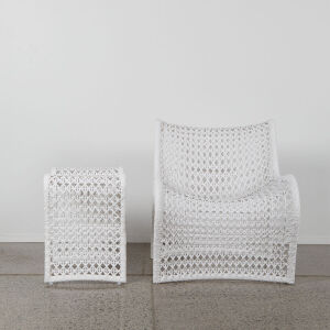 An Indoor Outdoor Organic Form White Table And Chair Set