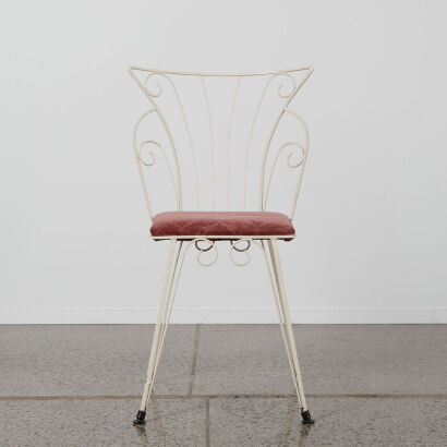 A Retro Wire Vanity Chair With Pink Velvet Cushion Seat