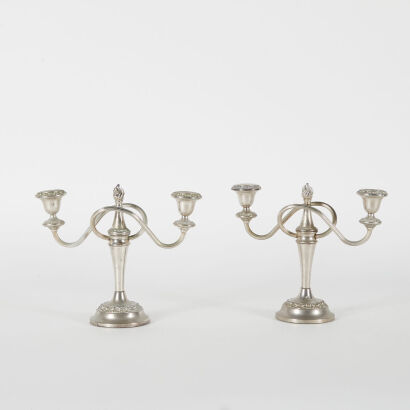 A Pair Of Ornate Candelabras