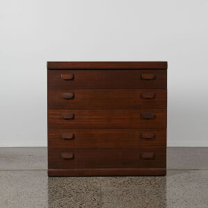 A Five Draw Chest In Mahogany Stain