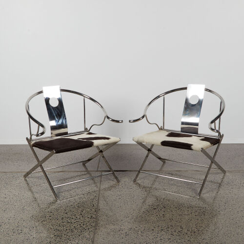 A Pair Of Postmodern Cowhide Yoke Chairs