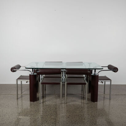 A Suite Of Six Postmodern Design Chairs And Glass-Topped Table