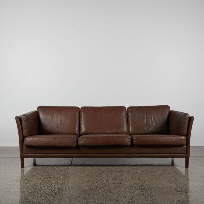 A Mid Century Danish Brown Leather Three Seater Sofa