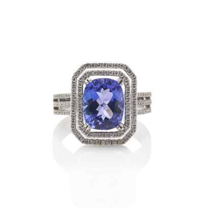 An Emerald Cut Tanzanite and Diamond Ring