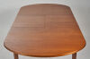 A Nathan Furniture Extendable Teak Oval Dining Table - 5