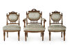 A French Louis XVI Style Walnut and Giltwood Seven-Piece Salon Suite