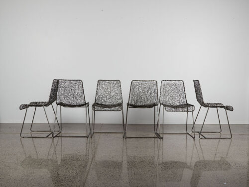 A Suite Of Six Paperclip Chairs