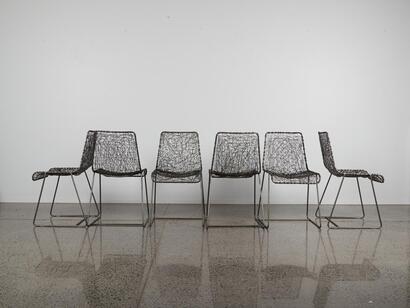 A Suite Of Six Paperclip Chairs
