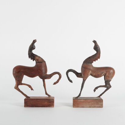 A Pair Of Metal Horses