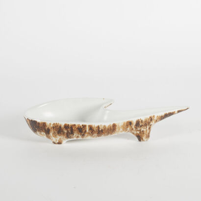 A Vintage Cream And Brown Ceramic Vase With Feet