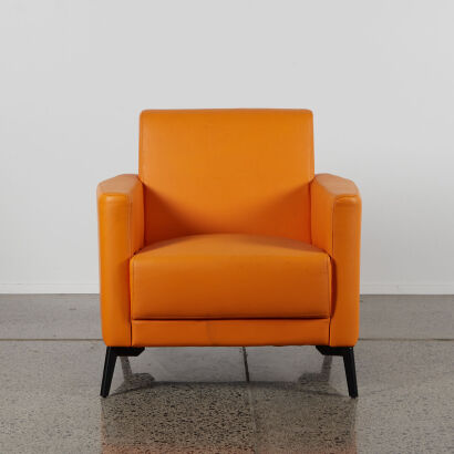 A Veuve Lovers Orange Armchair
