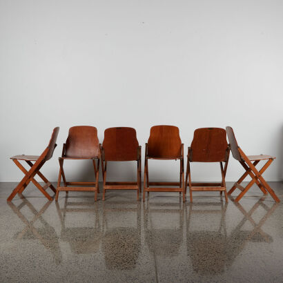 A Suite Of Storkline Folding Chairs