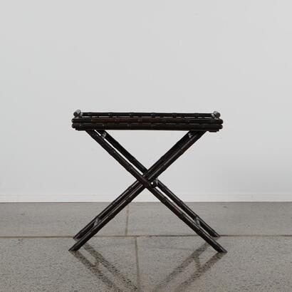 A Bamboo Serving Tray With Folding Base
