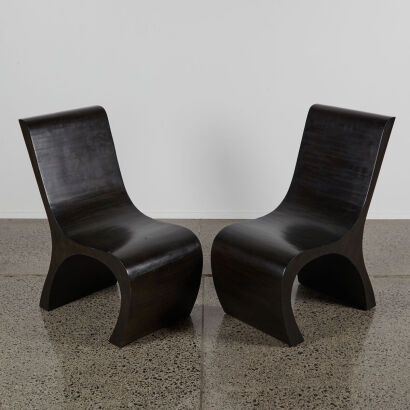 A Pair Of Modern Curved Form Laminate Timber Chairs