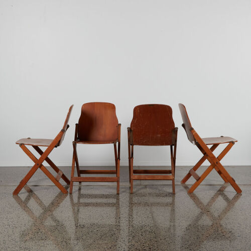 A Set Of Four Storkline Folding Chairs