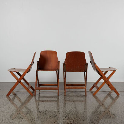 A Set Of Four Storkline Folding Chairs
