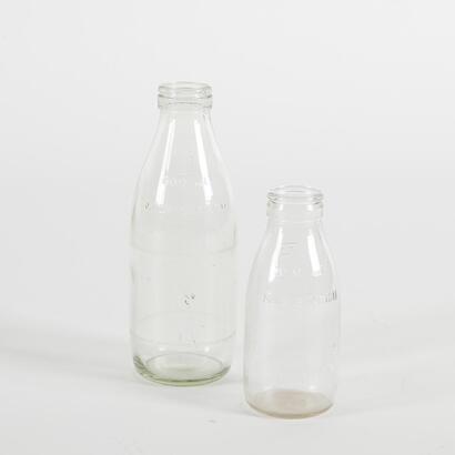 A Vintage Milk And Cream Bottle