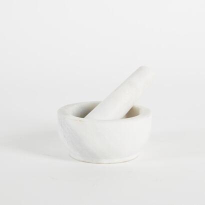 A Marble Mortar And Pestle
