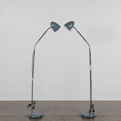 A Gooseneck Floor Standing Lamp In Grey And Chrome