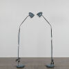 A Gooseneck Floor Standing Lamp In Grey And Chrome