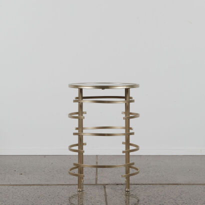 A Round Gold Side Table with A Mirrored Top