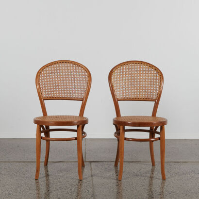 A Pair Of Vintage Bentwood And Cane Chairs
