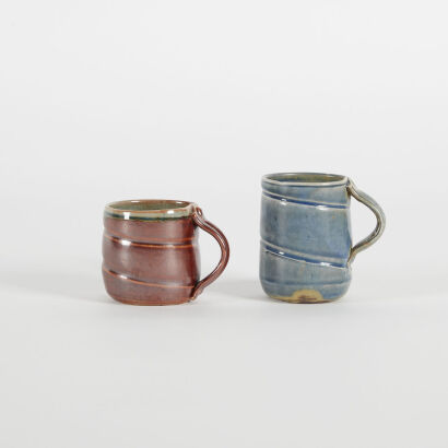 A Pair of Sarah Dansey Glazed Pottery Cups