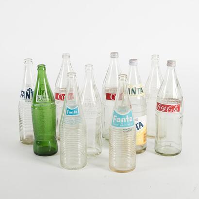 A Set Of Ten 1980's Soda Bottles