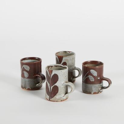 A Set Of Four Glazed Studio Pottery Mugs
