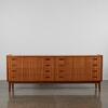 A Mid Century Teak Veneer Set Of Drawers With Eight Drawers