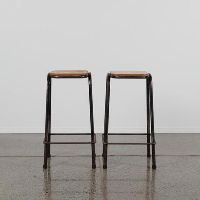 A Pair Of Vintage Industrial Lab Stools