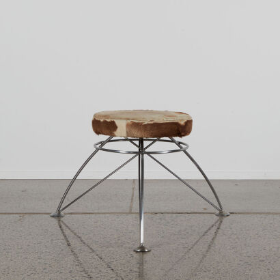 A Cowhide Stool With Steel Base