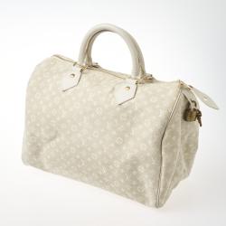 Louis Vuitton Louis Vuitton Pochette Cancun White Dune Monogram Mini