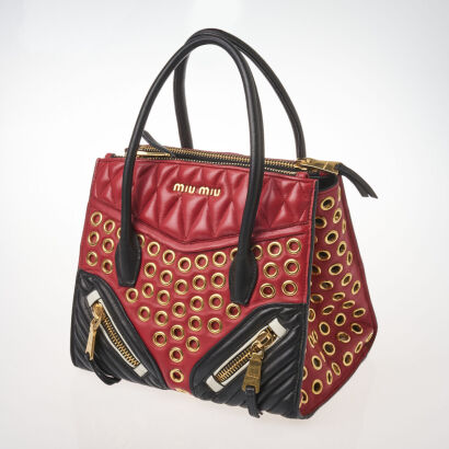 Miu Miu Grommet Embellished Biker Bag
