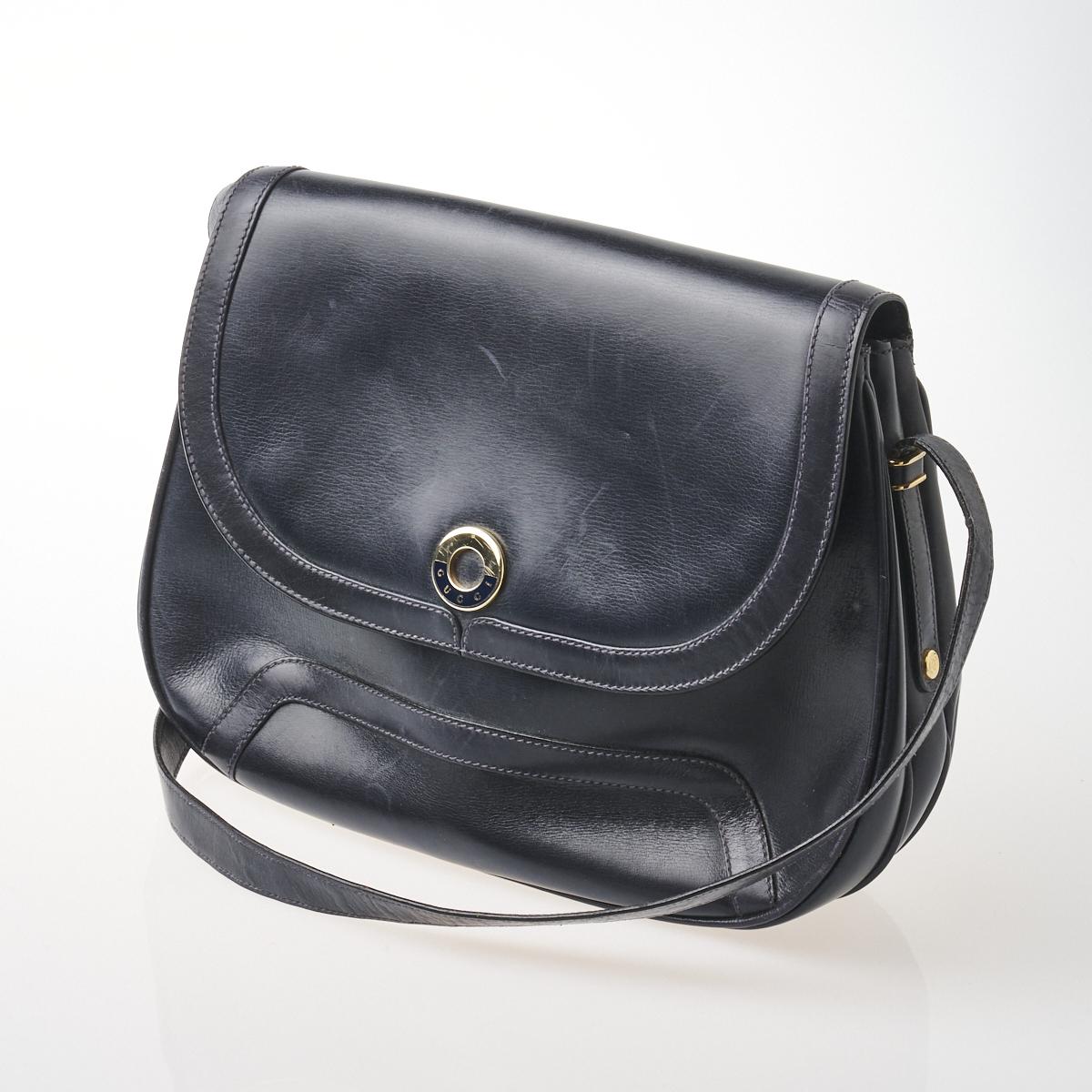 Sold at Auction: Gucci Vintage Black Leather Purse