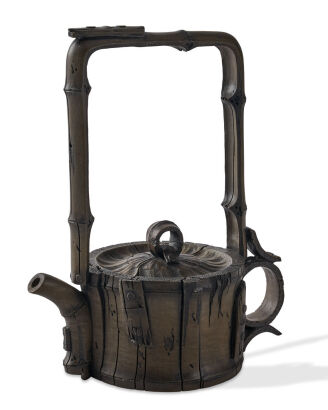 A Carved Stone Tea Pot