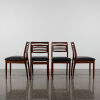 A Set Of Four Reupholstered Mid-Century Dining Chairs