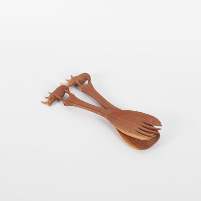 A Pair Of Craved Wooden Salad Servers