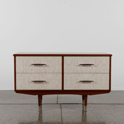 A Mid-Century Mahogany Four Drawer With A Formica Draws