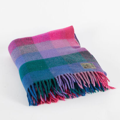 An Onehunha Woolen Mills Travel Rug
