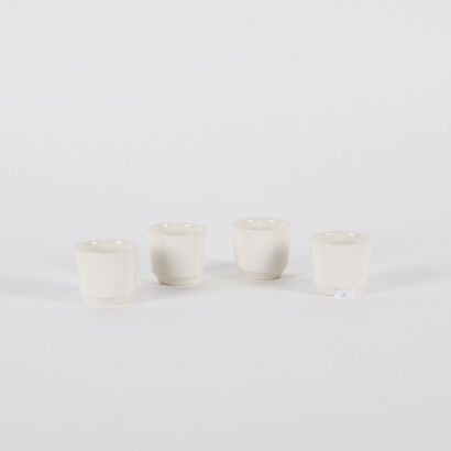 A Set Of Four Crown Lynn Egg Cups