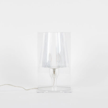 A Transparent Kartell Take Table Lamp