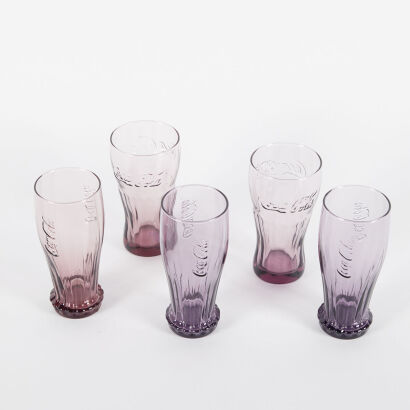 A Set Of Collectible Magenta Coca Cola Tumblers