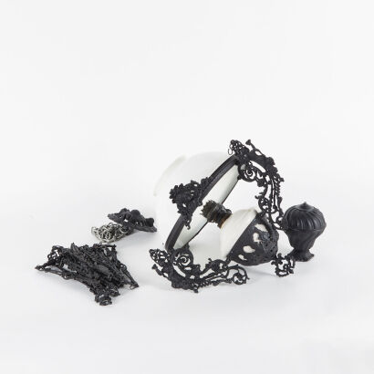 A Wrought Iron Malaccan Lamp