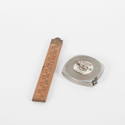 A Vintage Tape Measure And Ruler