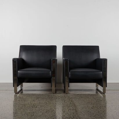 A Pair Of Black & Chrome Arm Chairs
