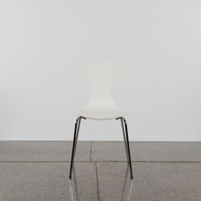 A White Ant Style Chair with Chrome Legs