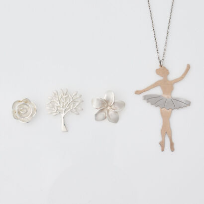 A Collection of Silver Pendants