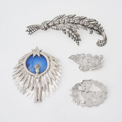 A Collection of Sterling Silver Brooches