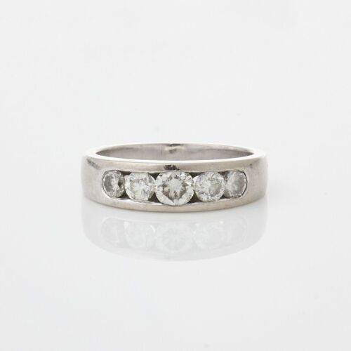 An 18ct White Gold channel set diamond band